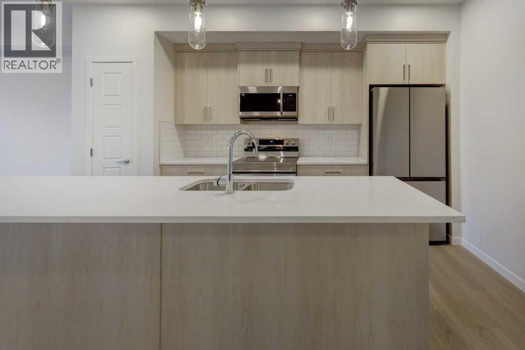 308, 245 Edith Place Nw, Calgary, Alberta  T3R 2C9 - Photo 8 - A2275301