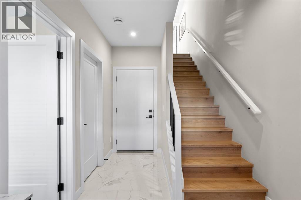 7813 Spring Willow Drive Sw, Calgary, Alberta  T3H 6C9 - Photo 6 - A2279709