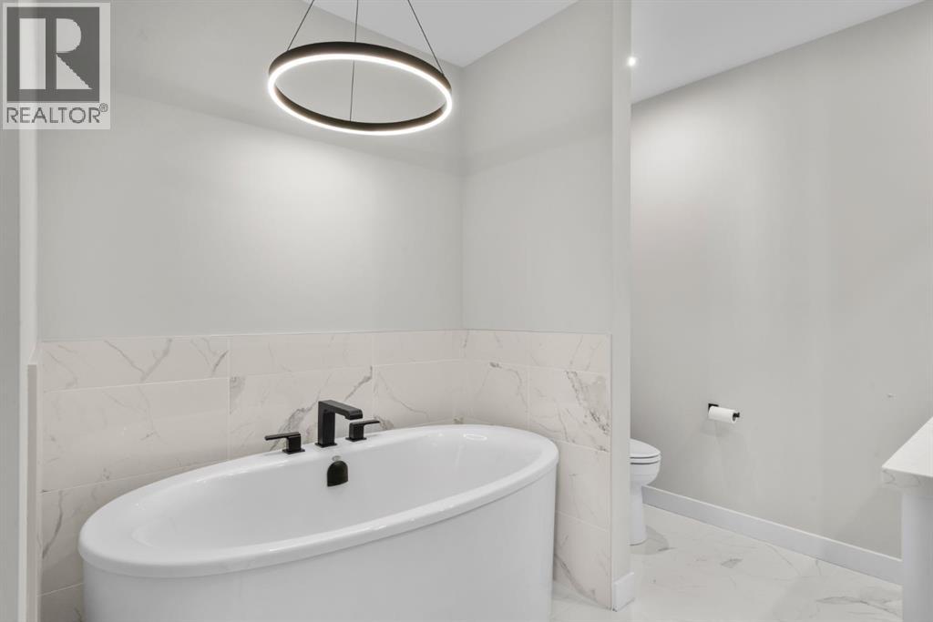 7813 Spring Willow Drive Sw, Calgary, Alberta  T3H 6C9 - Photo 40 - A2279709