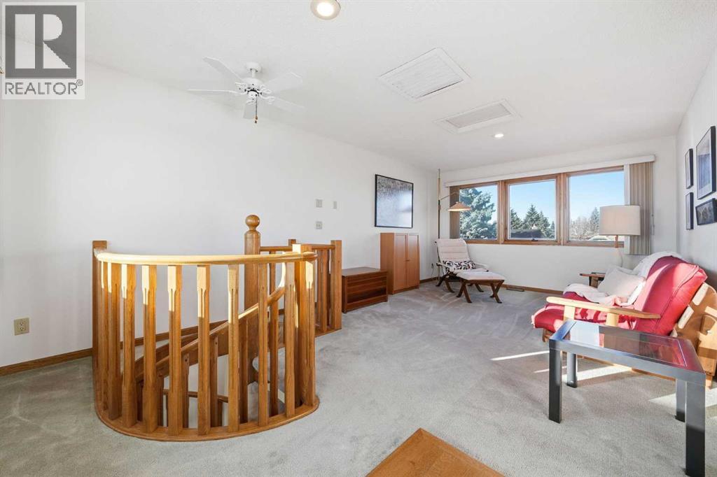 32 Woodgrove Crescent Sw, Calgary, Alberta  T2W 3Z1 - Photo 33 - A2275659