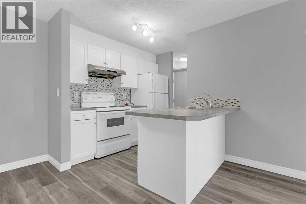 103, 5555 Falsbridge Drive Ne, Calgary, Alberta  T3J 3E8 - Photo 2 - A2258662