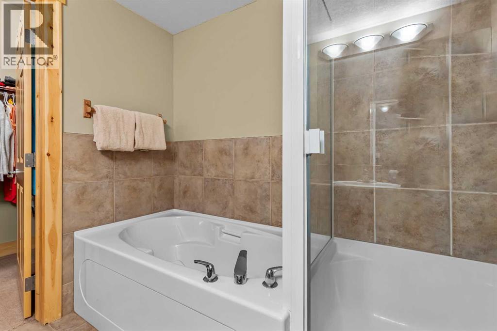 215, 175 Crossbow Place, Canmore, Alberta  T1W 3H7 - Photo 14 - A2278315