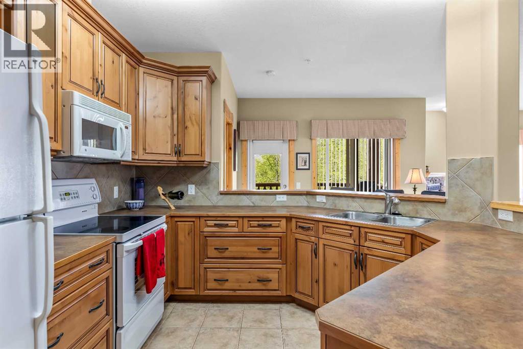 215, 175 Crossbow Place, Canmore, Alberta  T1W 3H7 - Photo 29 - A2278315