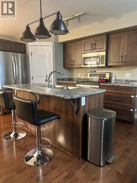 221 Callen Drive, Fort Mcmurray, Alberta  T9K 0X7 - Photo 3 - A2263408