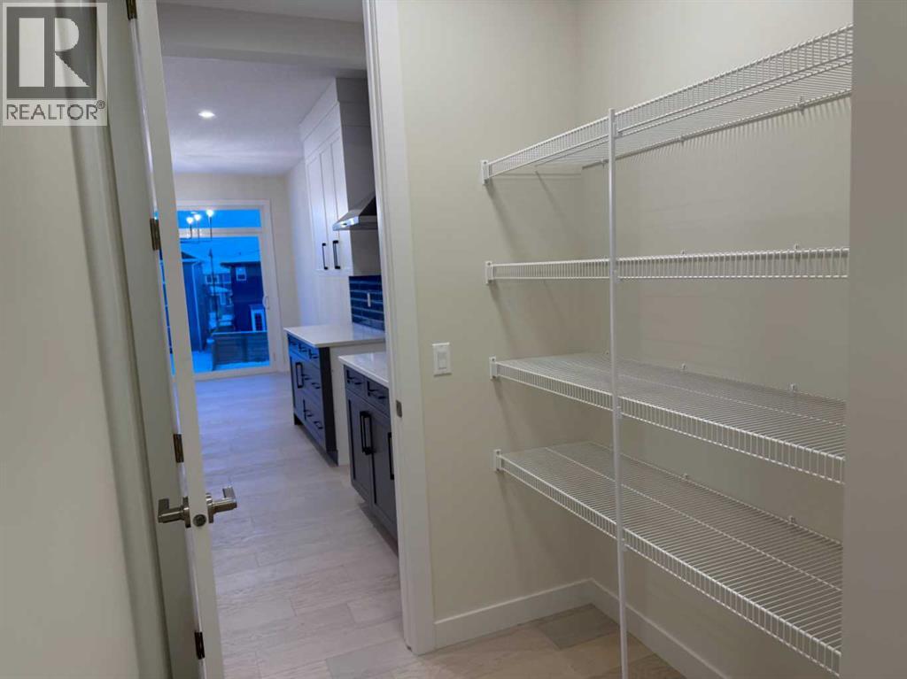 92 Sundown Crescent, Cochrane, Alberta  T4C 1Y3 - Photo 6 - A2228997