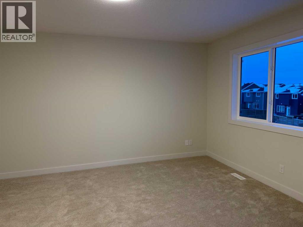 92 Sundown Crescent, Cochrane, Alberta  T4C 1Y3 - Photo 26 - A2228997