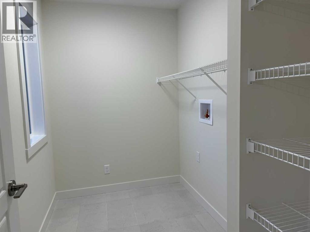 92 Sundown Crescent, Cochrane, Alberta  T4C 1Y3 - Photo 32 - A2228997