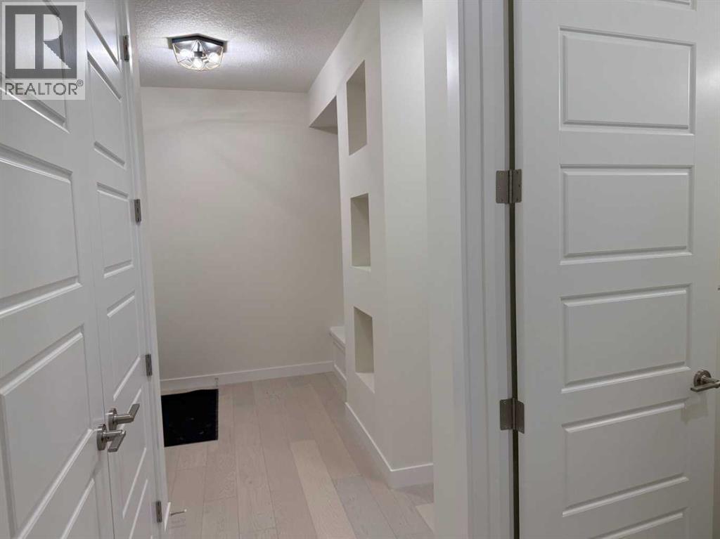 92 Sundown Crescent, Cochrane, Alberta  T4C 1Y3 - Photo 5 - A2228997