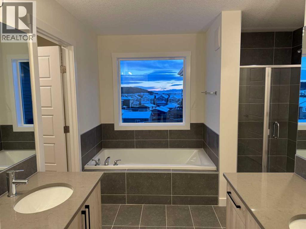 92 Sundown Crescent, Cochrane, Alberta  T4C 1Y3 - Photo 21 - A2228997