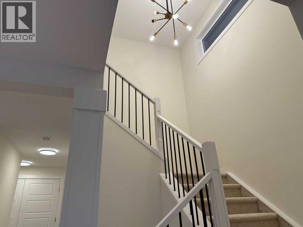 92 Sundown Crescent, Cochrane, Alberta  T4C 1Y3 - Photo 19 - A2228997