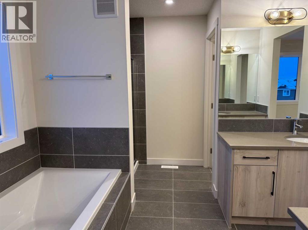 92 Sundown Crescent, Cochrane, Alberta  T4C 1Y3 - Photo 22 - A2228997