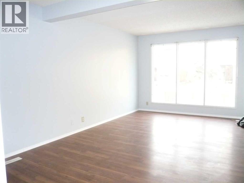 90 Abalone Crescent Ne, Calgary, Alberta  T2A 6X8 - Photo 4 - A2252528