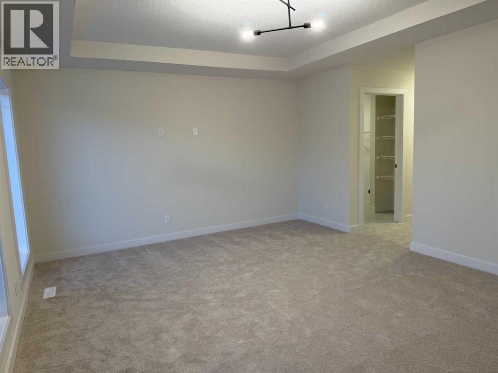 92 Sundown Crescent, Cochrane, Alberta  T4C 1Y3 - Photo 36 - A2228997