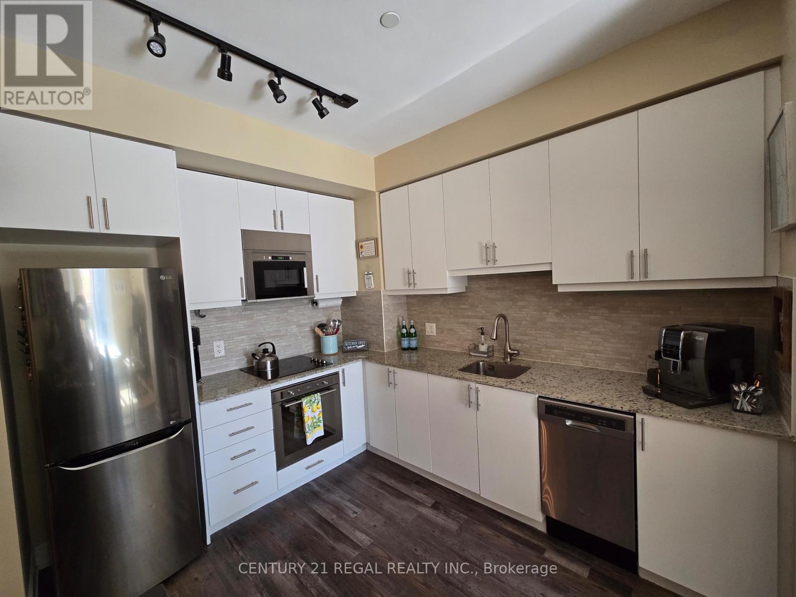 229 - 2 Eva Road, Toronto, Ontario  M9C 0A9 - Photo 2 - W12728018