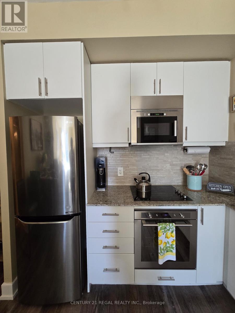 229 - 2 Eva Road, Toronto, Ontario  M9C 0A9 - Photo 3 - W12728018