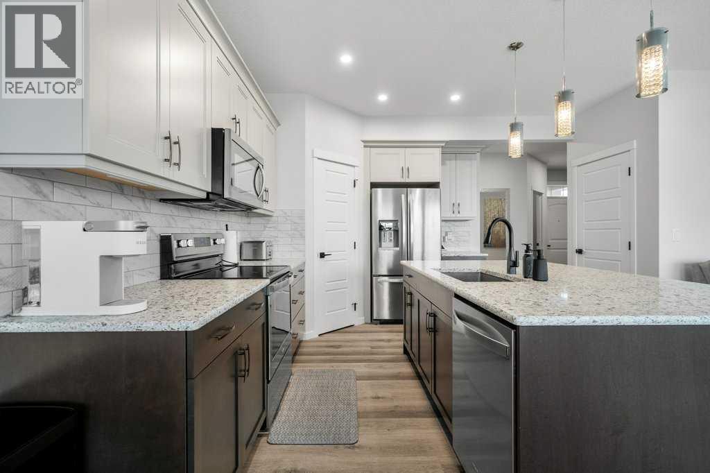 102 Creekside Way Sw, Calgary, Alberta  T2X 4A9 - Photo 11 - A2275504