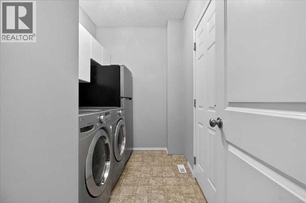 157 Wentworth Park Sw, Calgary, Alberta  T3H 5B3 - Photo 7 - A2280692