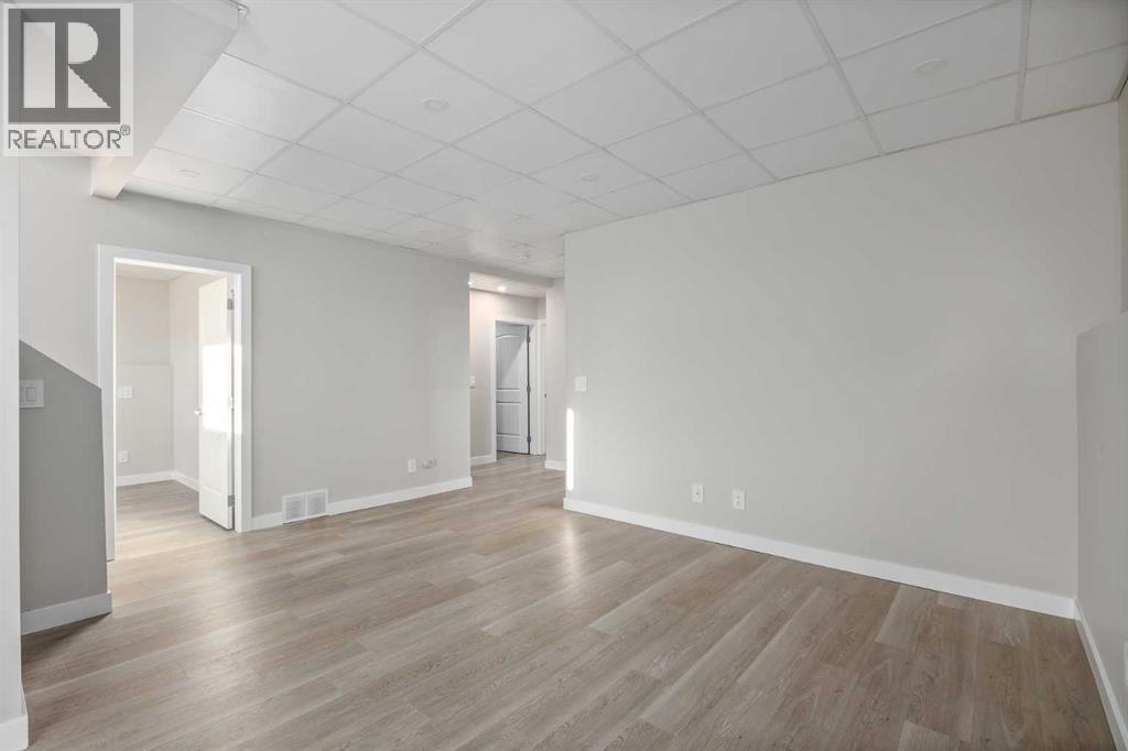 57 Luxstone Crescent Sw, Airdrie, Alberta  T4B 2W7 - Photo 27 - A2281014