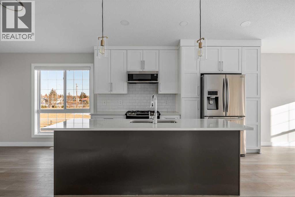 57 Luxstone Crescent Sw, Airdrie, Alberta  T4B 2W7 - Photo 6 - A2281014