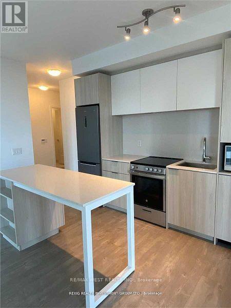 404 - 70 Annie Craig Drive, Toronto, Ontario  M8V 0G2 - Photo 4 - W12728318