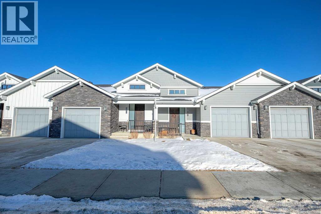 12572 Crestmont Boulevard Sw, Calgary, Alberta  T3B 6J5 - Photo 4 - A2277212