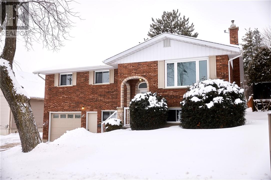 Welcome to this immaculate all brick raised ranch in the heart of New Sudbury — a truly move-in-ready home that’s been beautifully cared for from top to bottom. Offering 3 spacious bedrooms and 2.5 bathrooms, with updated kitchen, granite countertop and  breakfast bar.  This home is perfect for families or anyone looking for comfort and functionality in a friendly, established neighbourhood. You’ll love the convenience of the attached garage and interlock driveway, along with the bright, well-maintained interior that makes settling in easy. Step outside from the convenient patio doors off the dining room to discover a huge backyard with access to a greenbelt — an ideal space for kids to play, summer entertaining, or simply enjoying a little extra privacy. Located close to schools, shopping, parks, and scenic walking trails, this home checks all the boxes for everyday living. Clean, bright, welcoming, and ready for its next chapter. (id:48254)