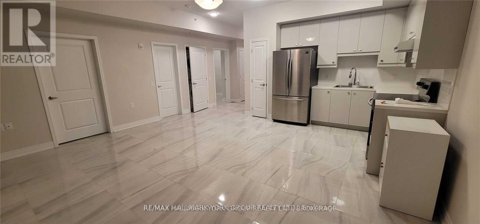 102 - 32 WELLINGTON STREET E, Aurora, Ontario