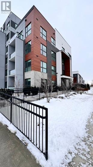 105 - 50 Kaitting Trail, Oakville, Ontario  L6M 5N3 - Photo 2 - W12729216