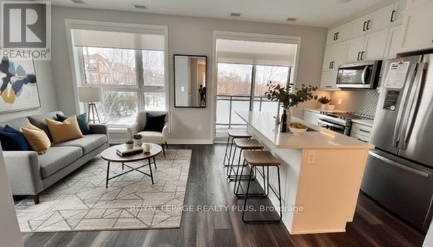 105 - 50 Kaitting Trail, Oakville, Ontario  L6M 5N3 - Photo 3 - W12729216