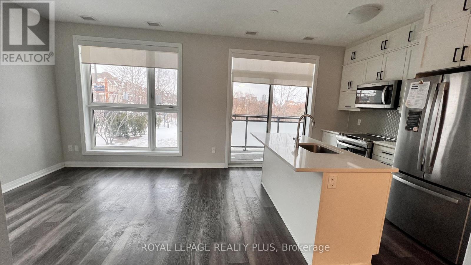 105 - 50 Kaitting Trail, Oakville, Ontario  L6M 5N3 - Photo 4 - W12729216