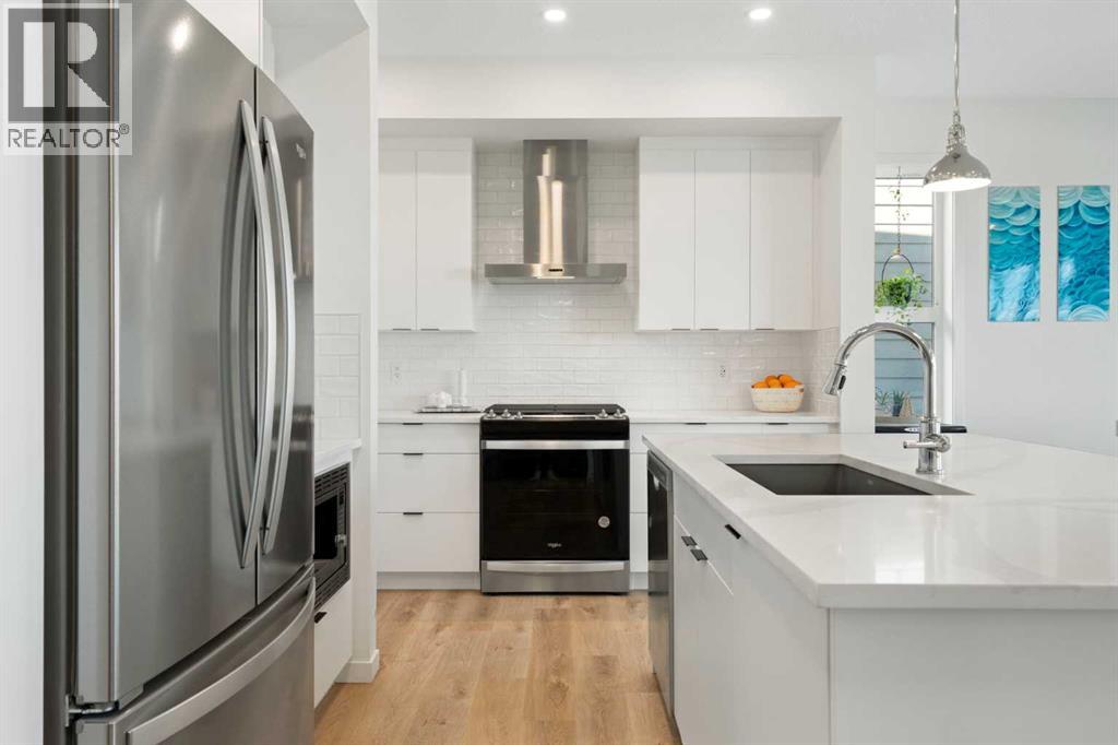 36 Magnolia Bay Se, Calgary, Alberta  T3M 3M9 - Photo 4 - A2281702