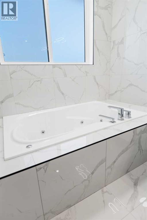 21 Sunvalley View, Cochrane, Alberta  T4C 0X8 - Photo 38 - A2274587