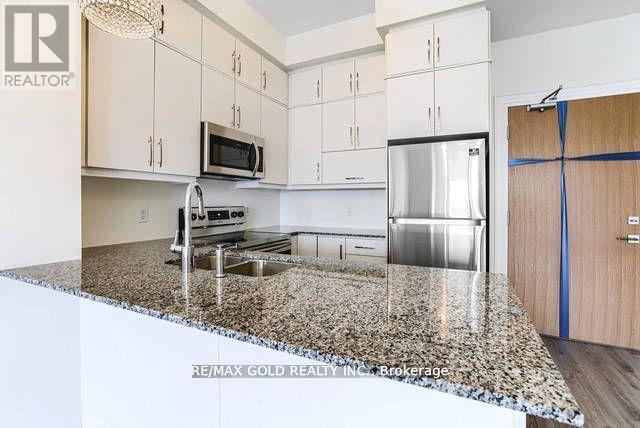 607 - 128 Grovewood Common, Oakville, Ontario  L6H 0X3 - Photo 6 - W12730632