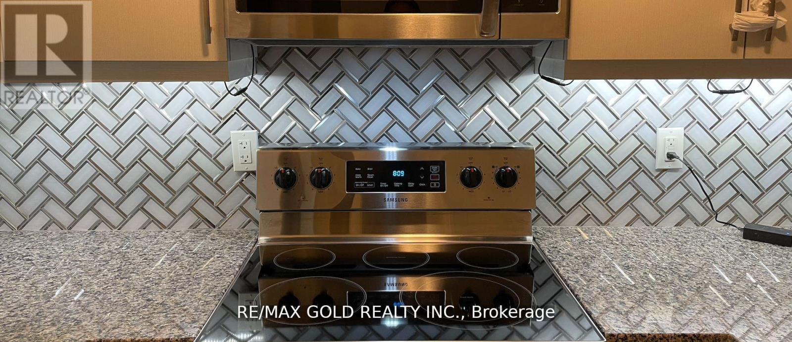 607 - 128 Grovewood Common, Oakville, Ontario  L6H 0X3 - Photo 7 - W12730632