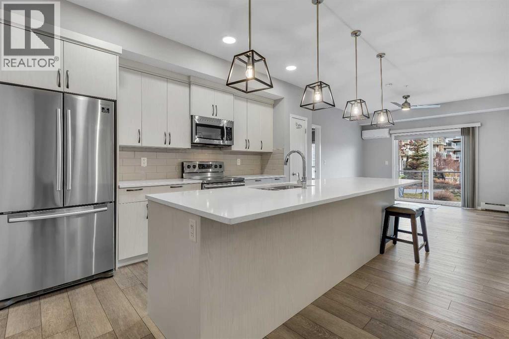 113, 370 Harvest Hills Common Ne, Calgary, Alberta  T3K 2M8 - Photo 13 - A2271172