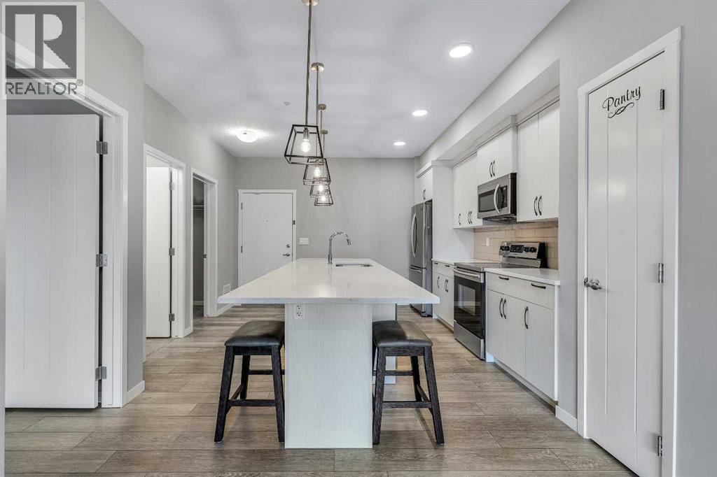 113, 370 Harvest Hills Common Ne, Calgary, Alberta  T3K 2M8 - Photo 14 - A2271172