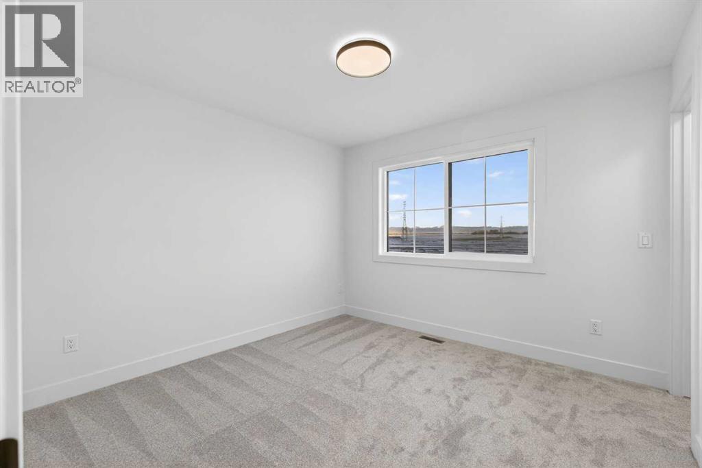 107 North Bridges Garden, Langdon, Alberta  T0J 1X3 - Photo 30 - A2278213