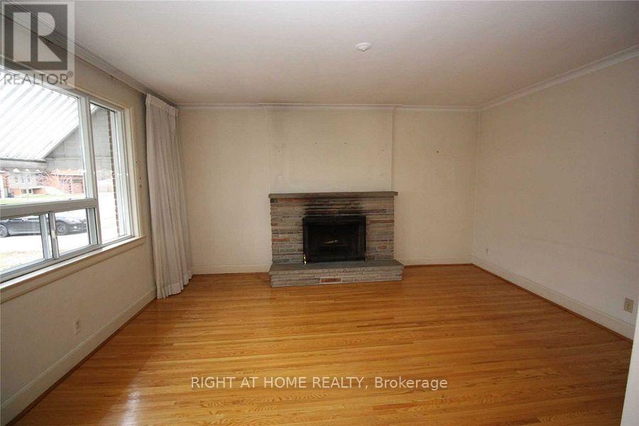 123 Ashbourne Drive, Toronto, Ontario  M9B 4H9 - Photo 3 - W12731426