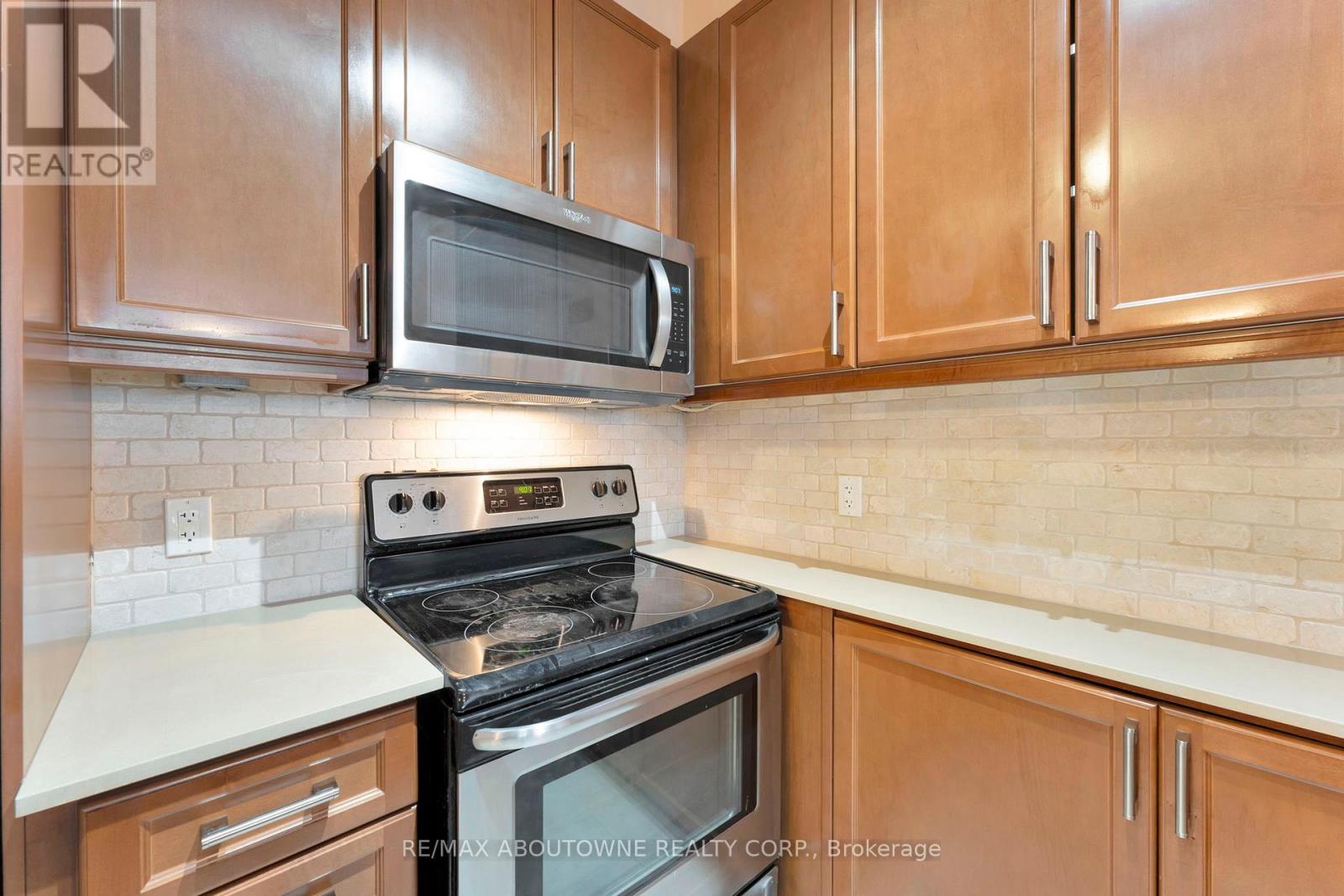 306 - 2470 Prince Michael Drive, Oakville, Ontario  L6H 0G9 - Photo 9 - W12731522