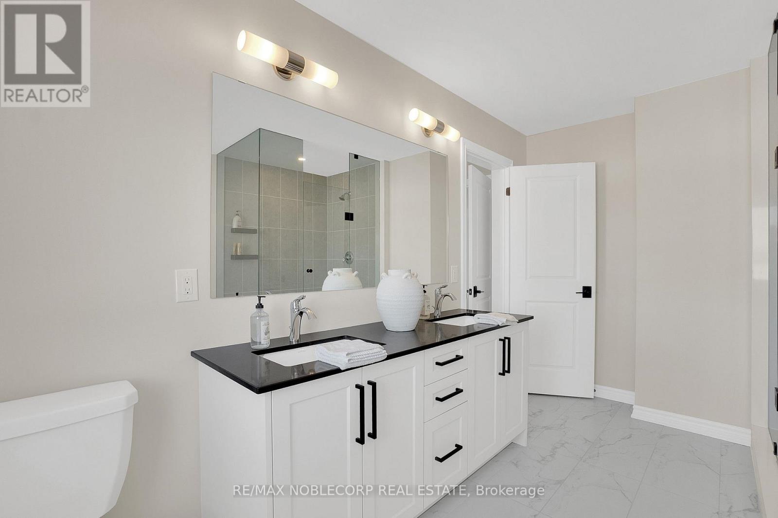 36 Felhazi Trail, Essa, Ontario  L3W 0A4 - Photo 29 - N12731738