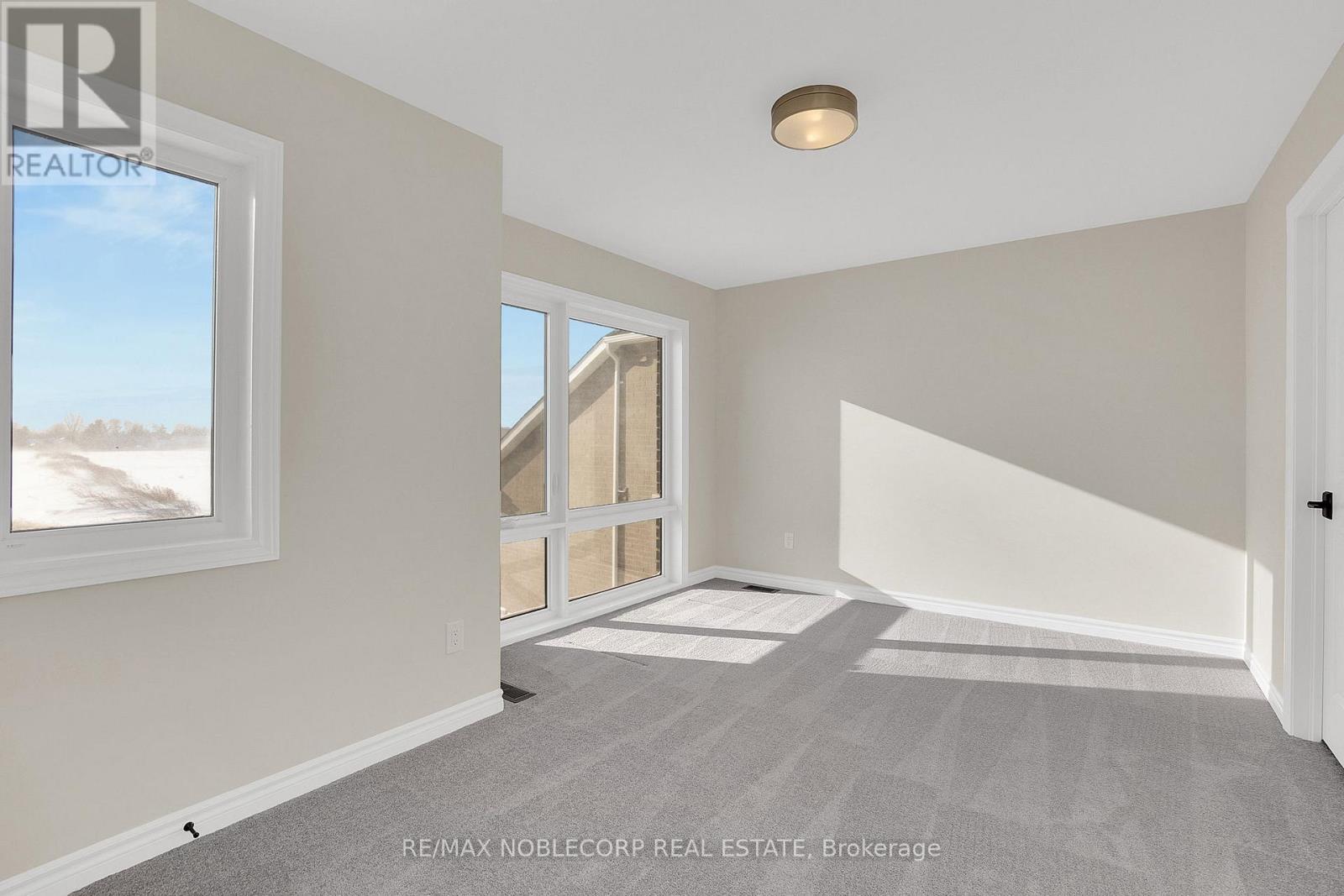 36 Felhazi Trail, Essa, Ontario  L3W 0A4 - Photo 32 - N12731738