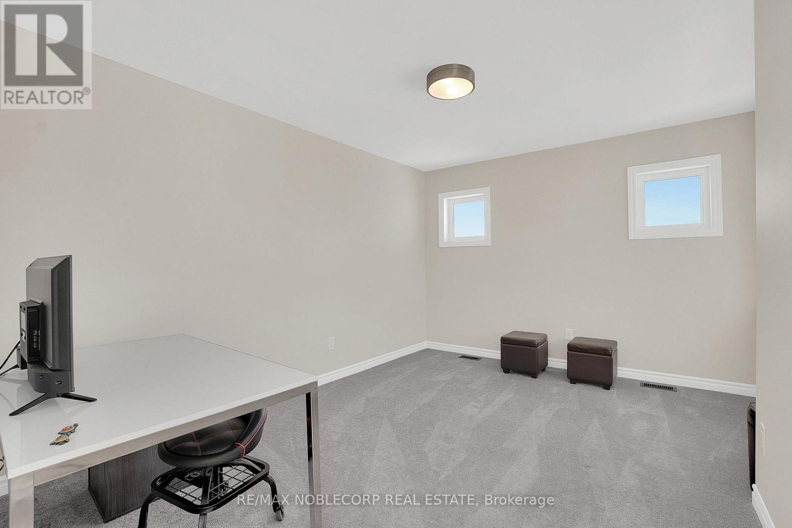 36 Felhazi Trail, Essa, Ontario  L3W 0A4 - Photo 33 - N12731738