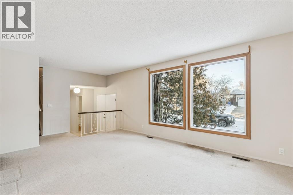 219 Silvercreek Close Nw, Calgary, Alberta  T3B 4G4 - Photo 9 - A2278010