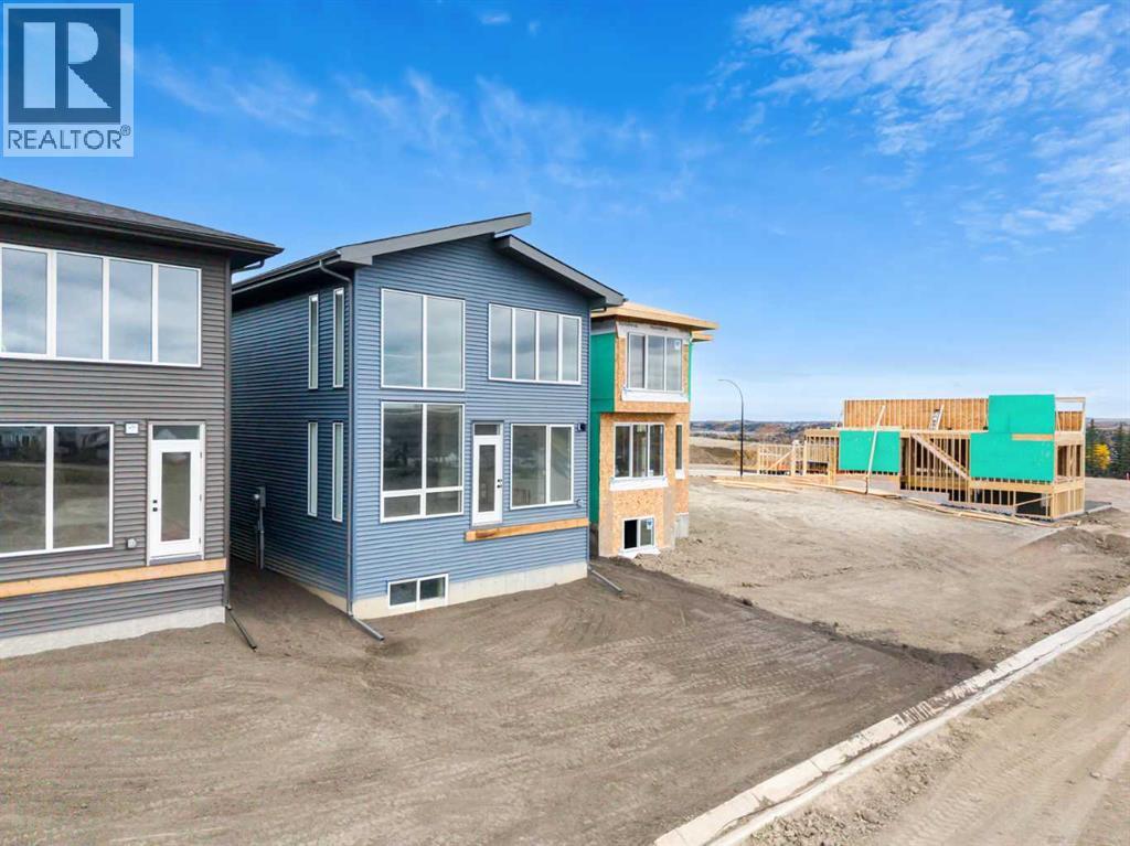 50 Heritage Heath, Cochrane, Alberta  T0T 0T0 - Photo 4 - A2262939