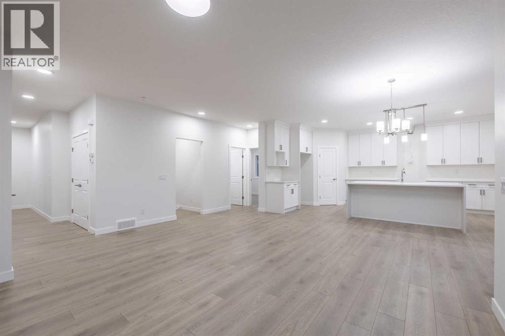 145 Sunstone Way, Balzac, Alberta  T4B 5T5 - Photo 7 - A2261463