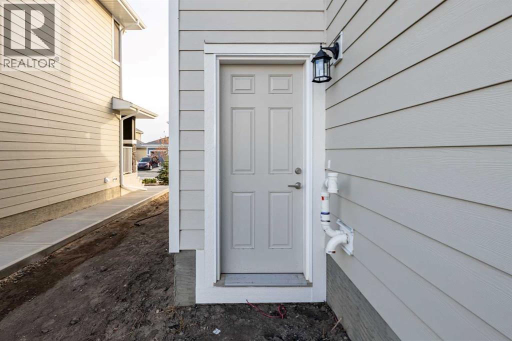 145 Sunstone Way, Balzac, Alberta  T4B 5T5 - Photo 2 - A2261463