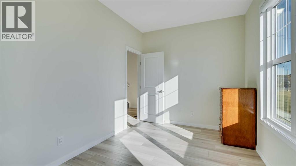 18 Amblehurst Path Nw, Calgary, Alberta  T3P 1W8 - Photo 8 - A2281924