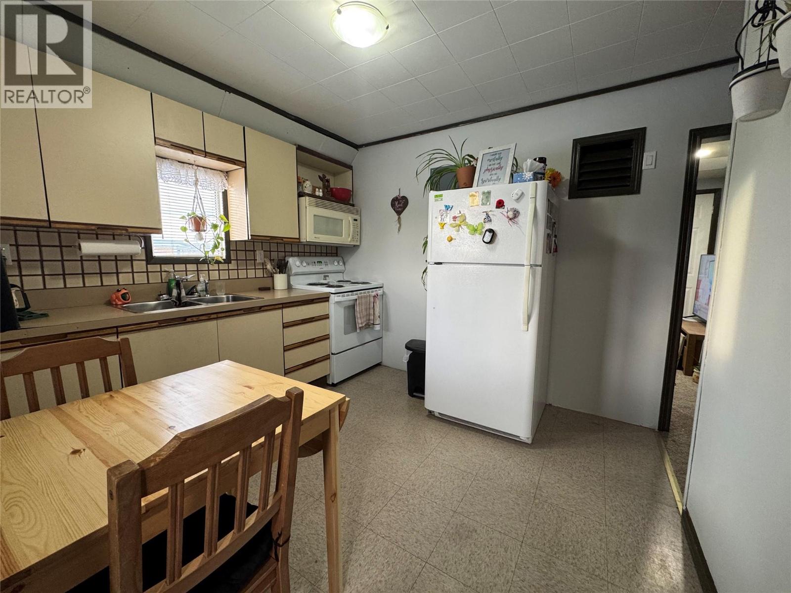 5007 Sukrit Parmar Lane, Pouce Coupe, British Columbia  V0C 2C0 - Photo 3 - 10374040