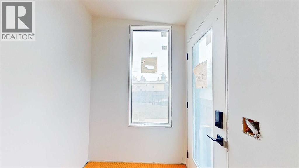 5616 Lodge Crescent Sw, Calgary, Alberta  T3E 5Y7 - Photo 7 - A2270927