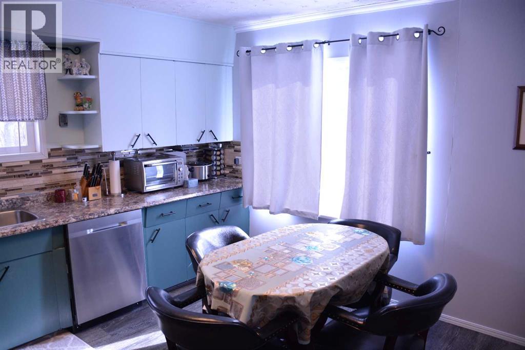 81573 Hwy 2, Rural Northern Sunrise County, Alberta  T0H 2R0 - Photo 15 - A2282054